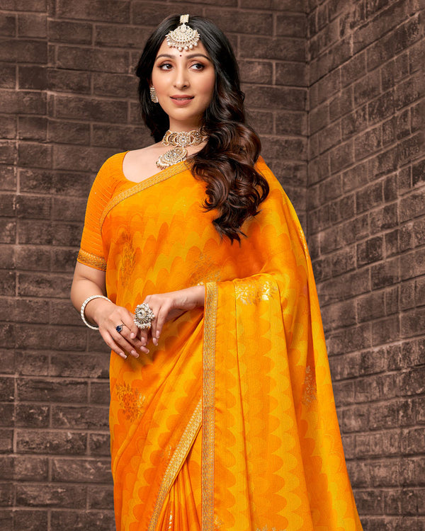 Vishal Prints Yellowish Orange Printed Chiffon Saree With Foil Print And Zari Border