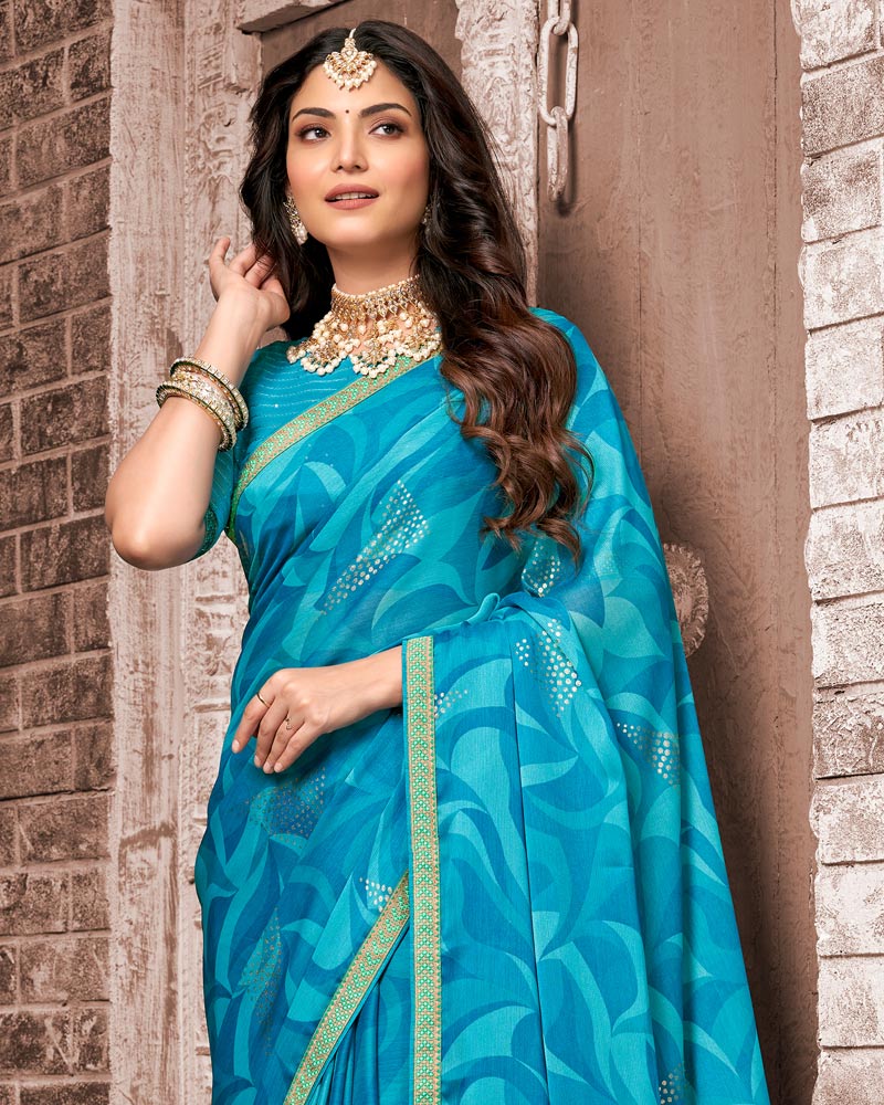 Vishal Prints Dark Turquoise Blue Printed Chiffon Saree With Foil Print And Zari Border