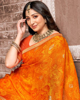 Vishal Prints Dark Orange Printed Chiffon Saree With Foil Print And Zari Border