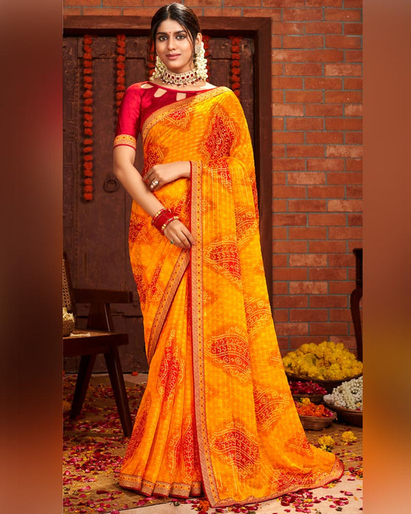 Vishal Prints Yellowish Orange Patterned Chiffon Bandhani Print Saree With Fancy Border
