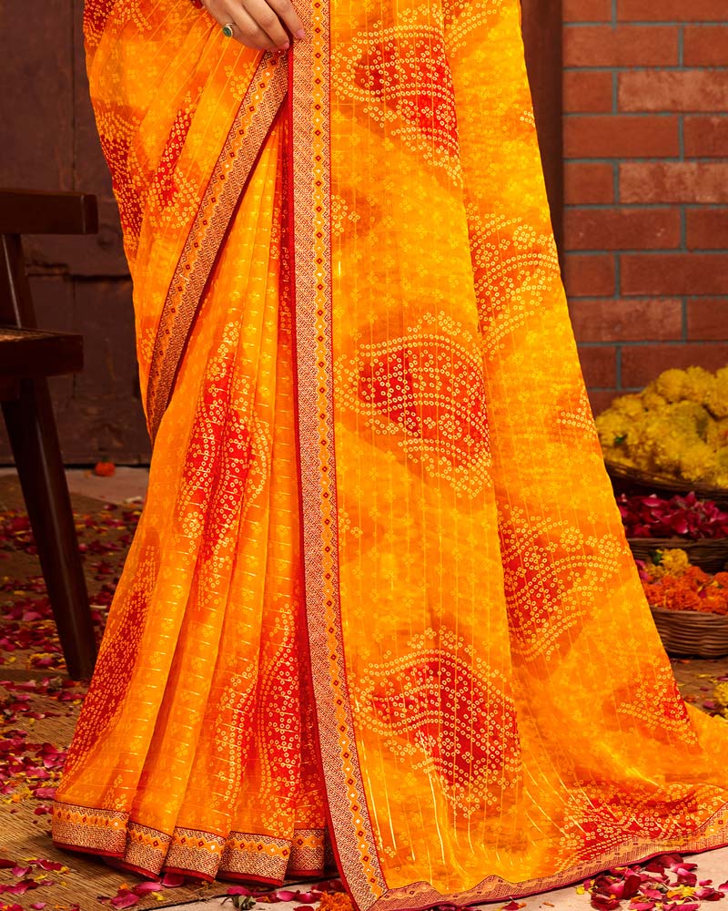 Vishal Prints Yellowish Orange Patterned Chiffon Bandhani Print Saree With Fancy Border