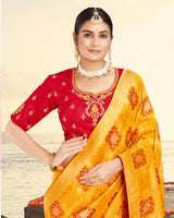 Vishal Prints Orange Silk Weaving Saree With Zari Border And Tassel