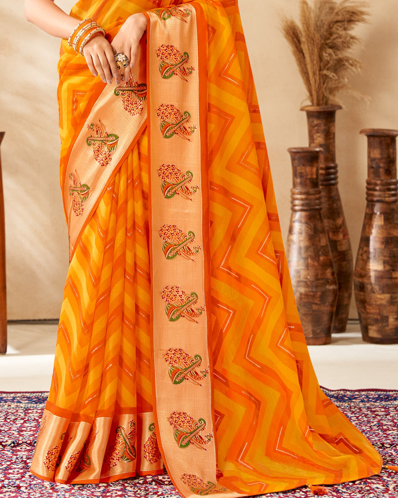 Vishal Prints Orange Printed Chiffon Saree With Foil Print And Weaved Viscose Border