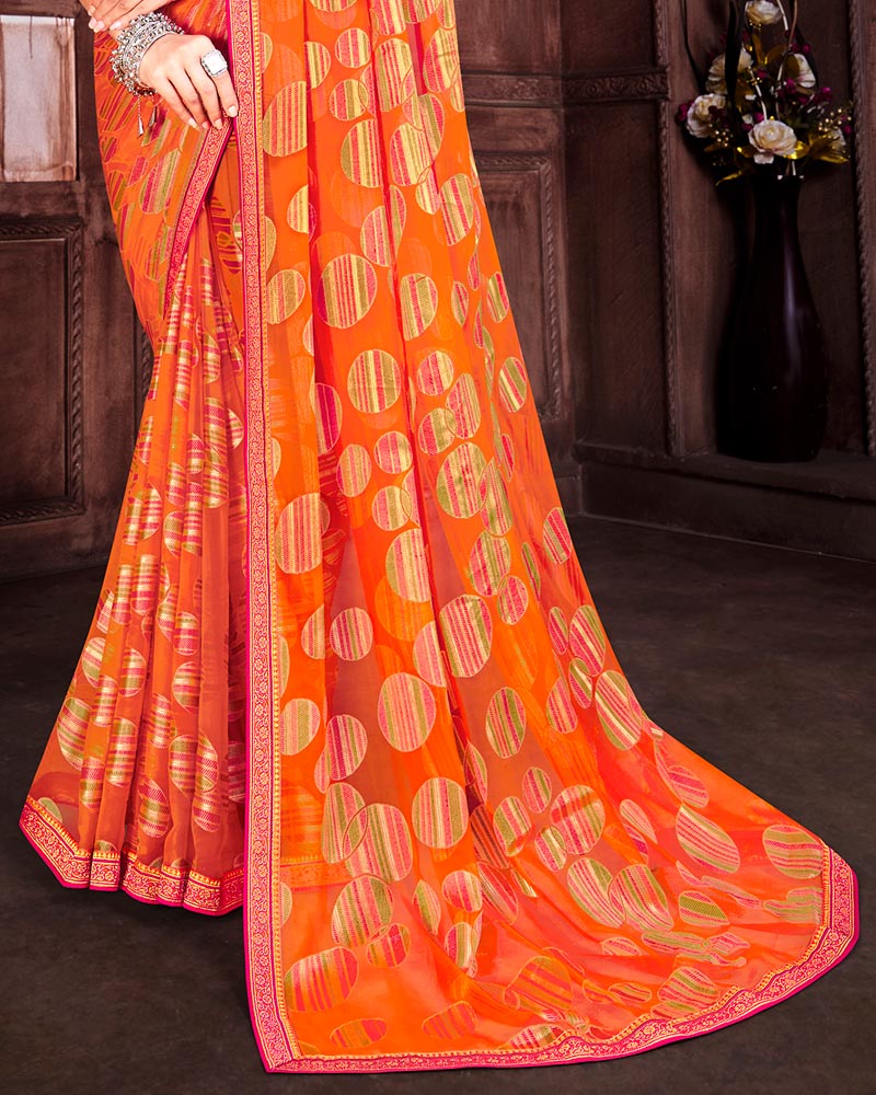Vishal Prints Orange Brasso Saree With Foil Print And Zari Border