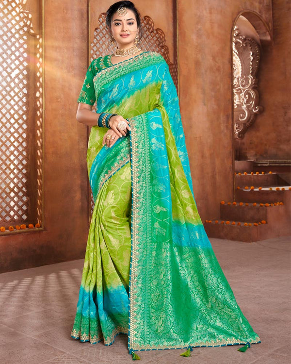 Vishal Prints Mehandi And Dark Green Silk Weaving Saree With Zari Border And Tassel